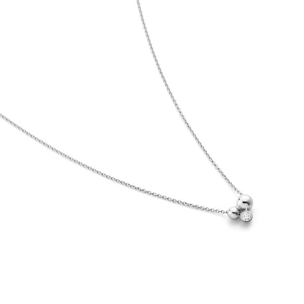 silver chain with pendant motif of 3 spheres and one that contains a whit diamond