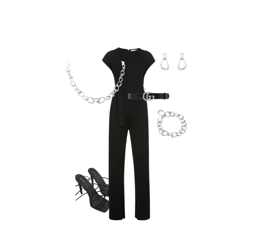 Silver Georg Jensen statement necklace, bracelet and earrings places with black jumpsuit, belt and heels.